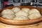 Korean delicious steamed dumplings in bamboo basket