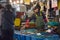 Korean Fishmonger at fish market, Daepohang Port