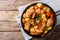 Korean food: Dakdoritang chicken stew with vegetables close-up o