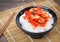 Korean food, top view  kimchi with a rice in bowl tasty yummy and spicy on wood table background for healthy.