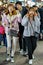 Korean girls tasting street food on Myeongdong market in Seoul