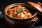 korean kimchi in a large clay pot