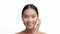 Korean Millennial Lady Applying Moisturizer Cream On Face, White Background