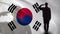 Korean soldier silhouette saluting against national flag, military operation