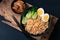 Korean spicy instant noodles soup with bok choy and boiled egg