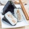 Korean triangle kimbap Samgak made with nori, rice and tuna fish, similar to Japanese rice ball onigiri, square