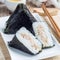 Korean triangle kimbap Samgak made with nori, rice and tuna fish, similar to Japanese rice ball onigiri, square