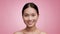 Korean Woman Smiling To Camera Posing Shirtless Over Pink Background