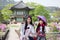 Korean women wearing Hanbok at Gyeongbokgung Palace\'s Pavilion, Seoul South Korea