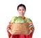 Korean women wearing hanbok Hold a basket of fresh vegetables to make kimchi.