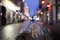 Korsgatan, one of the main shopping streets in Gothenburg, Sweden. In the foreground, in focus, are plants in planter.