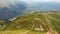 Koruldi lakes with gravel road and mountains panorama in summer