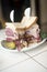 Kosher deli combination sandwich pastrami corned beef tongue cole slaw and Russian dressing