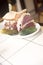 Kosher deli combination sandwich pastrami corned beef tongue cole slaw and Russian dressing on seeded Jewish rye bread