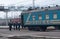 Kostantinovka, Ukraine - December 05, 2017: Passengers and an old train at the railway station