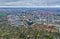 Koszalin, Poland - 25 March 2019 - Aerial view on Koszalin city panorama with allotment gardens, factory brick chimney and block