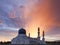 Kota Kinabalu mosque with dramatic and colorful clouds at sunrise in Sabah, Malaysia