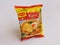 Kota Kinabalu, Sabah Malaysia-21 May 2020. Maggi instant noodle curry flavor own by Nestle company, isolated on white background.