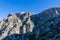Kotor - Idyllic hiking trail from Kotor to Derinski Vrh, Lovcen mountains, Dinaric Alps, Montenegro. Massive rock formations