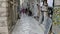 Kotor, Montenegro - 27 June, 2017. Souvenir shops in old town Kotor Montenegro. Young girl walking through narrow street