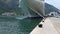 Kotor, Montenegro - 27 June, 2017. Tilting up by big cruise ship at adriatic sea. Boat in port Kotor bay Montenegro