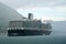 Kotor, Montenegro, June,24, 2015. Large cruise ship Nieuw Amsterdam in Boka Kotorska Bay in the strong rain