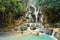 Kouangxi waterfall with wooden bridge at Luang Prabang in Laos