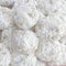 `Kourabiedes` traditional Greek Christmas shortbread cookies covered with icing sugar