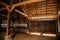 Kourim, Czech Republic, 26 December 2021: Inside rustic wooden old barn hay, Attic of hayloft, Bales dry straw, light beams farm,