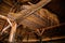 Kourim, Czech Republic, 26 December 2021: Inside rustic wooden old barn hay, Attic of hayloft, Bales dry straw, light beams farm,