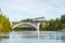 Kouvola, Finland - 18 September 2020: Autumn landscape of bridge with moving old steam passenger train Ukko-Pekka and Kymijoki