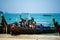 Krabi province, Railay beach, Thailand - February 18, 2019: Tourists get out of a long-tail taxi boat. Jump into the water on the