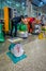 KRABI, THAILAND - FEBRUARY 19, 2018: Close up of scales in front of worker man packaging luggages of tourists with