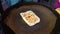 KRABI, THAILAND - JULY 17, 2016 : Man cook Dessert style of fried Roti with Banana, Thai Pancake on the Krabi Walking Street.