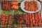 Krabi, Thailand: a local recipe of satay seasoned, skewered and grilled meat on banana leaf at night market in Ao Nang