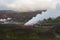 Krafla geothermal Power Station steaming.