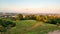 Krakow cityscape, Poland. View from afar, beautiful sammer sunset with people on the rest