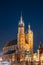 Krakow, Poland. Evening Night View Of St. Mary`s Basilica And Cl