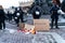 Krakow, Poland - October 25, 2020: Polish police gathered together and people wearing mask during pandemic in order to protest