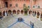 KRAKOW, POLAND - SEPTEMBER 3, 2016: People visit Collegium Maius Great College courtyard of the Jagellonian University