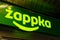Krakow, Poland, Zappka automated convenience store, shop green signage logo, detail, closeup, night time. Polish chain store