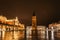 Krakow after rain,Poland.Main square with famous Christmas markets,Rynek Glowny at night with reflection,decorated timber huts,