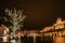 Krakow after rain,Poland.Main square with famous Christmas markets,Rynek Glowny at night with reflection,decorated Xmas tree.