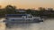 Krasnodar, Russia, May 5, 2019. Kuban river in the evening in Krasnodar, Pier and river tram on the water. View of the waterfront