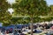 Krasnodar, Russia - October 7, 2018: People sit in an amphitheater with formed oaks in the foreground. Park Krasnodar or Galitsky