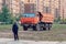 Krasnodar, Russia - Octrober 21 2021: Schoolboy is contemplating the profession of truck driver.