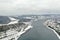 Krasnoyarsk on Enisey river from aerial view. Krasnoyarsk reservoir. Mountains landscape winter panoram snow