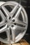 Krasnoyarsk, Russia, February 3, 2020: Mercedes Benz logo aluminum cast wheel, close-up, original silver wheel new in