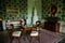 Krasny Dvur Chateau, North Bohemia, Czech Republic, 19 June 2021: Castle interior, Biedermeier furniture in living room table with