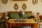 Krasny Dvur Chateau, North Bohemia, Czech Republic, 19 June 2021: Castle interior, Biedermeier furniture in living room table with